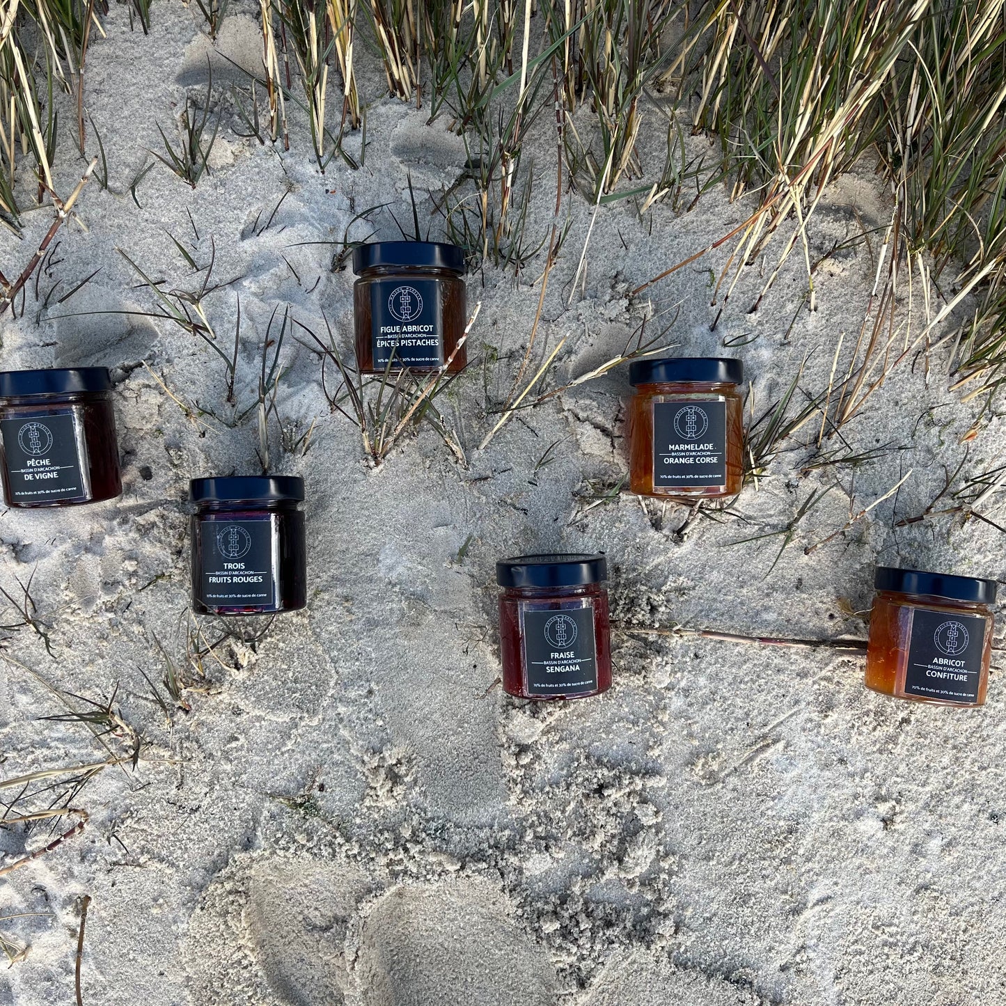Regroupement de confitures Marelia sur le sable